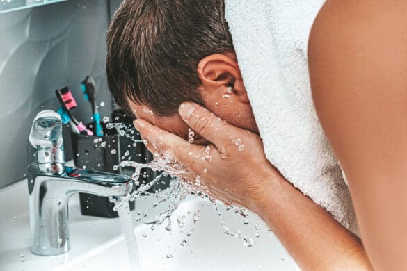 Dennis Stolpner washing face